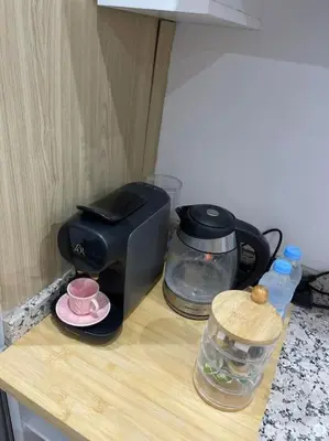 a counter top with a coffee maker and a toaster at La Bohéme - Duplex Neuf - Modern & Chic - Proche Gare - Confort - CLIM Parking et WIFI Gratuit ! GUELIZ in Marrakech