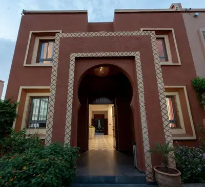 an entrance to a building with an arch way at Villa Targa in Marrakech
