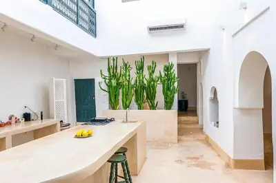 a kitchen with a counter with bananas on a island at Riad Orb Private Riad Breakfast Included in Marrakech