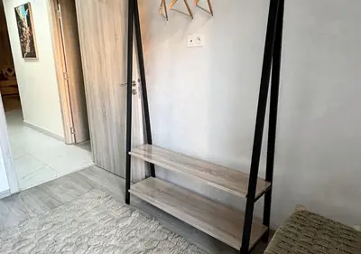 a room with a wooden bench in a room at Sérénité au coeur de Marrakech in Marrakech