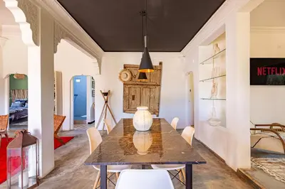a dining room with a table and chairs at Private villa Comfort and Relax Pool in Marrakech