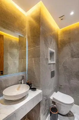 a bathroom with a toilet and a sink at Duplex Luxury and Comfort in Heart of Gueliz in Marrakech