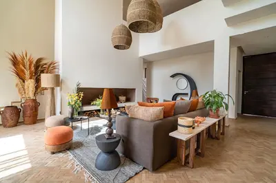 a living room with a couch and a table at Villa 61 in Marrakech