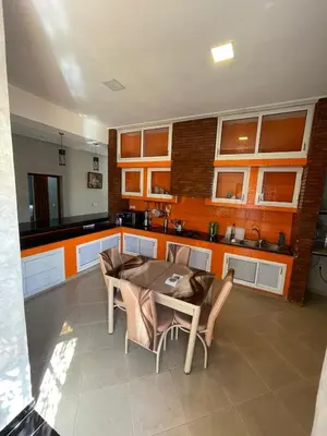 a kitchen with a table and chairs in it at Deluxe Private Villa in Marrakech
