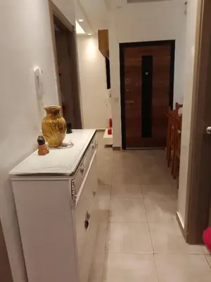 a kitchen with a counter with a vase on it at Appartement aux portes de Marrakech in Marrakech