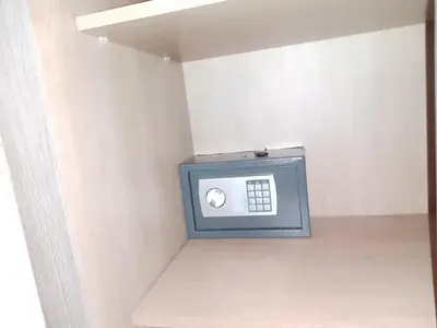 a small television in a corner of a room at Appartement aux portes de Marrakech in Marrakech