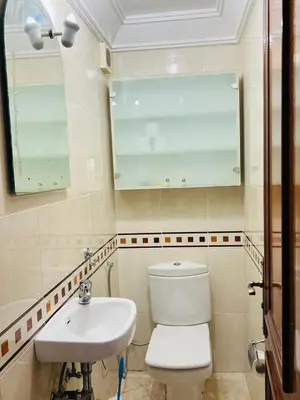 a bathroom with a toilet and a sink at Marrastay in Marrakech