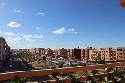 a view of a city with buildings and a street at beautiful appartement near airport in Marrakech