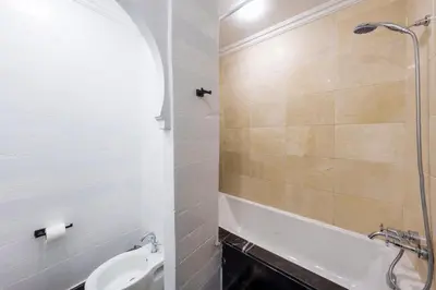 a bathroom with a sink and a shower at Exclusive Stay M-Avenue Marrakech in Marrakech