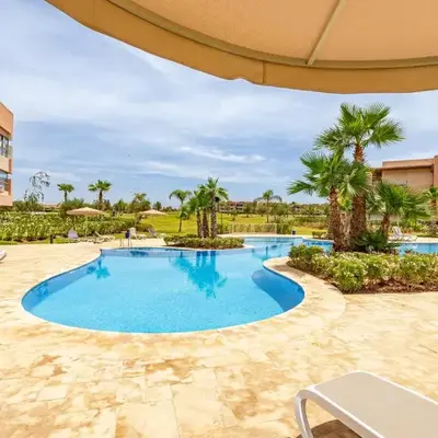 Luxury Garden-Level Apartment with Poolside Serenity