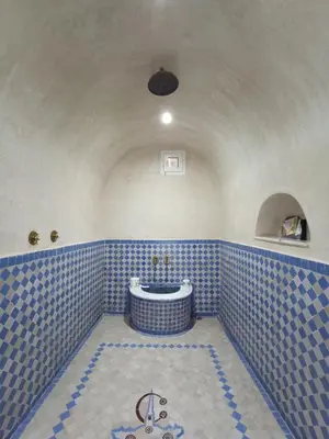 a blue tiled bathroom with a sink in a room at MARRAKECh TYPICAL HOUSE MAISON TYPIQUE MARRAKECH G2 40 in Marrakech