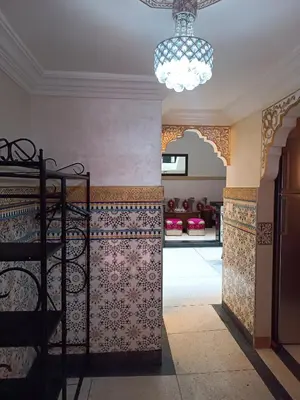 a room with a wall with a chandelier at MARRAKECh TYPICAL HOUSE MAISON TYPIQUE MARRAKECH G2 40 in Marrakech