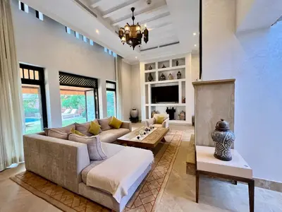 a living room with a couch and a table at Riad in Hotel M Avenue in Marrakech