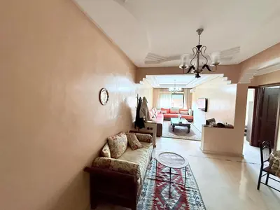 a living room with a couch and a table at Heart of Marrakech in Marrakech