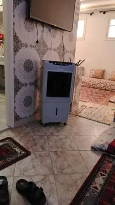 a room with a computer sitting on the floor at Angel 12 minutes from Marrakech airport in Marrakech