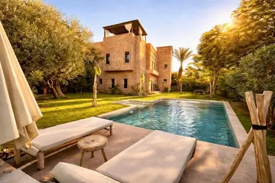 a villa with a swimming pool and a house at Private Riad Alemania in Marrakesh - Pool - Rooftop in Marrakech