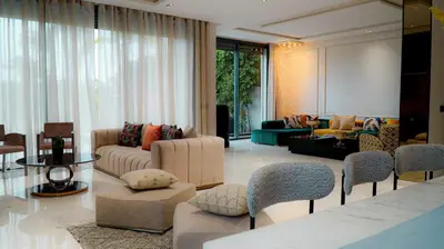 a living room with couches and chairs at Villa contemporaine in Marrakech