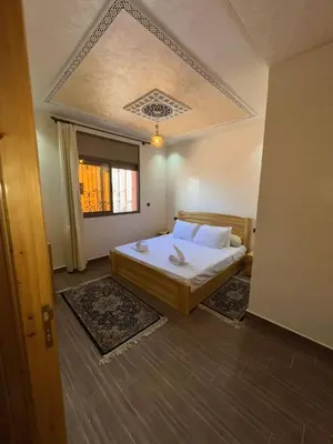 a bedroom with a bed in a room at villa soufia in Marrakech