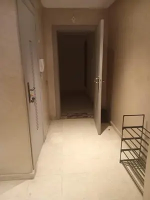 an empty hallway with a door in a room at Résidence SOFIA PALMERAIE in Marrakech