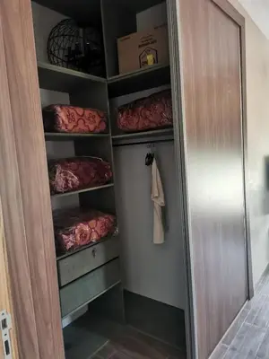 a walk in closet with lots of beds at Villa Zaina in Marrakech