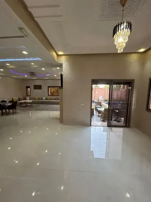 a large room with a chandelier and a lobby at villa Marrakesh in Marrakech