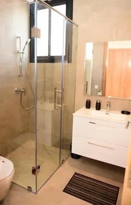 a bathroom with a shower and a sink and a toilet at Welcome Home! in Marrakech