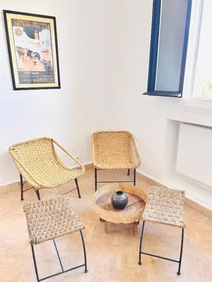 three chairs and a coffee table in a room at Villa Zaria Marrakech Heated Pool Family Friendly 25 Min To Medina in Marrakech