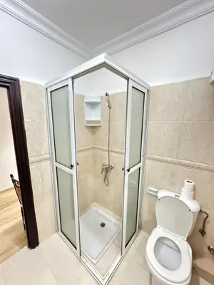 a bathroom with a shower and a toilet at le numéro 7 in Marrakech