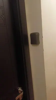 a bathroom door with a toilet paper dispenser on it at Premium village A644 in Marrakech