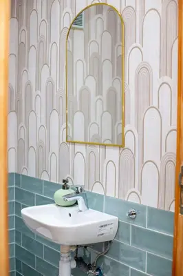 a bathroom with a sink and a mirror at Majorelle Elegance City Center in Marrakech