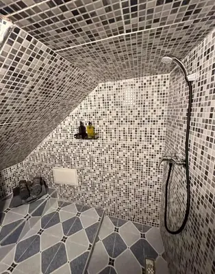 a bathroom with a shower and a tiled floor at Apartment in heart of Medina in Marrakech