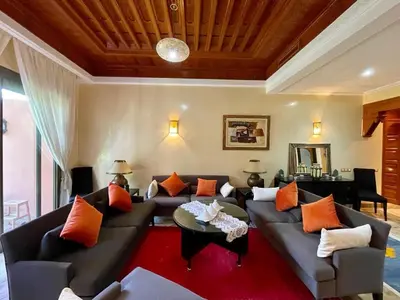 a living room with a couch and a table at Appartement à Marrakech in Marrakech
