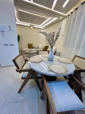 a dining room with a table and chairs at T1 Chic & Bright in Marrakech in Marrakech