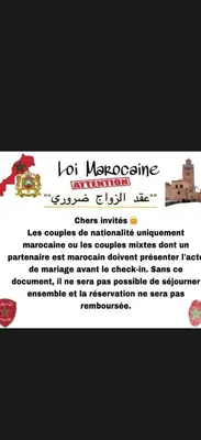 a picture of a sign that says l masqueradeulumulumulumulumulum at Appartement Spacieux A Majorelle in Marrakech
