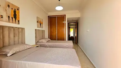 two beds in a room with two beds at Welcome to Chya House! in Marrakech
