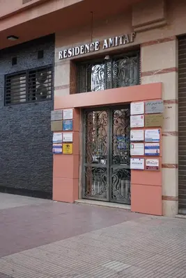 a building with a gate in front of it at Maison Nadia in Marrakech
