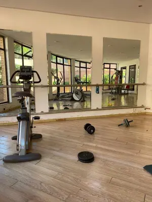 a room with a mirror and a camera on the floor at Peaceful heaven in Marrakech