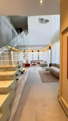 a large living room with a couch and a table at villa Argan, Confort & Modern avec PiscineChauffée in Marrakech