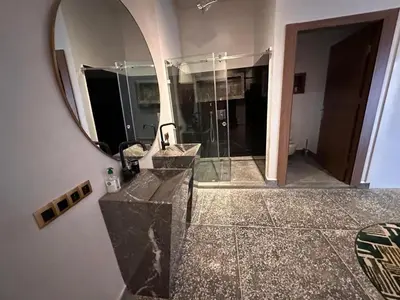 a bathroom with a sink and a mirror at Villa akiba in Marrakech