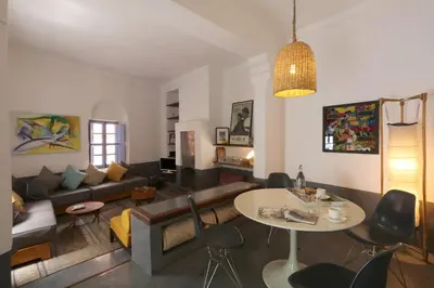 a living room with a couch and a table at mon riad in Marrakech