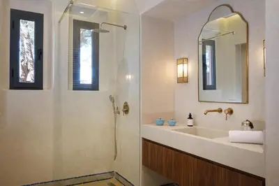 a bathroom with a sink and a shower at Villa Amelya - Amelkis Golf in Marrakech