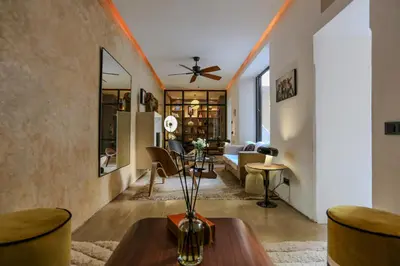 a living room with a couch and a table at Riad KO Nova in Marrakech