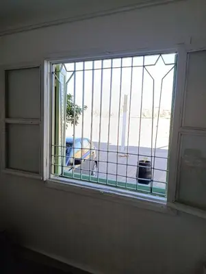 a window in a room with a view of a car at Marrakech welcome in Marrakech