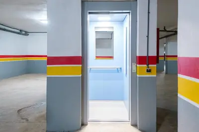 an open door in a room with red and yellow stripes at New! Apartment Gueliz 2 min M Avenue with Pool and 24h Security & Parking in Marrakech