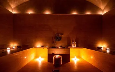 a room with a table with lights in it at Riad N5 in Marrakech