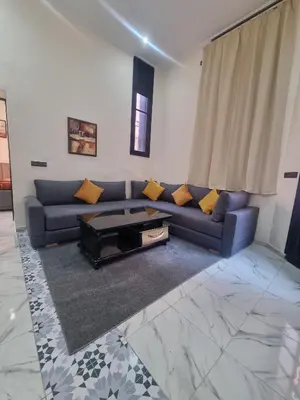 a living room with a couch and a coffee table at Guéliz Spirit in Marrakech