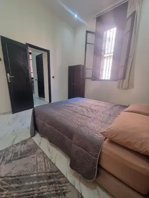 a bedroom with a bed and a large window at Guéliz Spirit in Marrakech