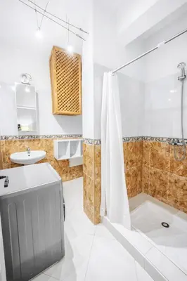 a bathroom with a shower and a sink at Luxe Studio 2min Carre Eden in Marrakech