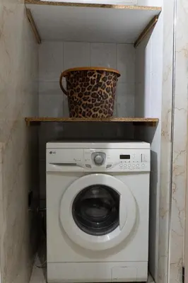 a washing machine with a basket on top of it at Appartement de luxe, à 2min de Guéliz in Marrakech