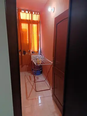 a room with a door and a shelf in a room at Magnifique appartement in Marrakech